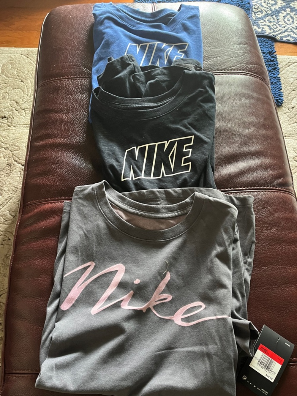 Nike T-shirts for women. One new with tags.